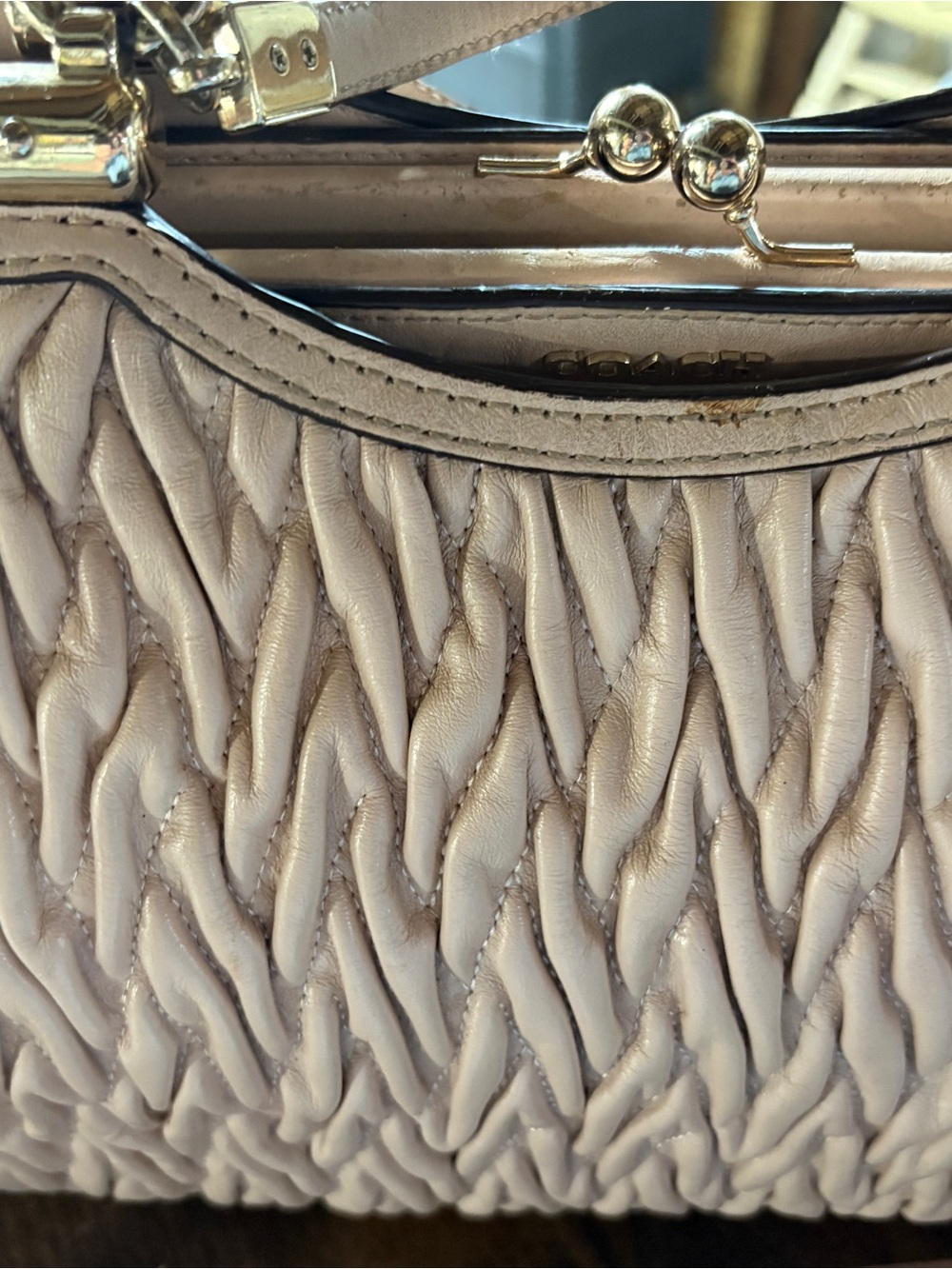 Coach Madison Kiss lock Pintucked Leather Satchel.